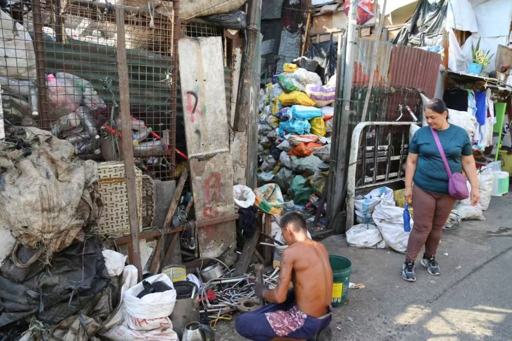 現金網:聂晓阳:马尼拉繁华之侧的贫穷世界 | 走笔天下