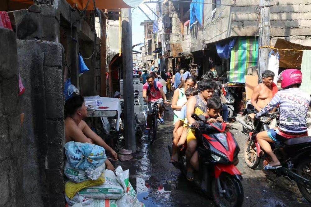 現金網:聂晓阳:马尼拉繁华之侧的贫穷世界 | 走笔天下